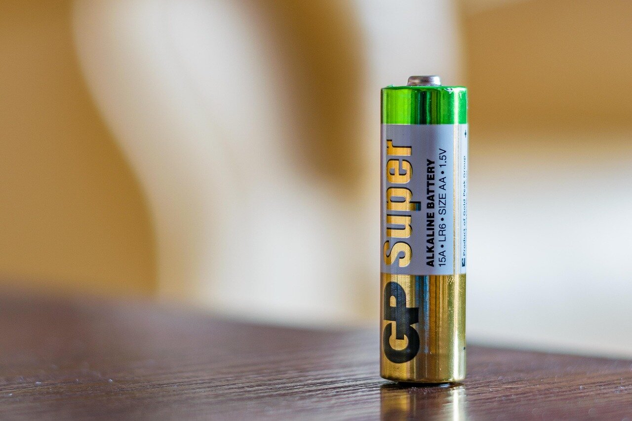 A recycling facility where used batteries are processed, emphasizing the importance of sustainable practices in battery production and disposal