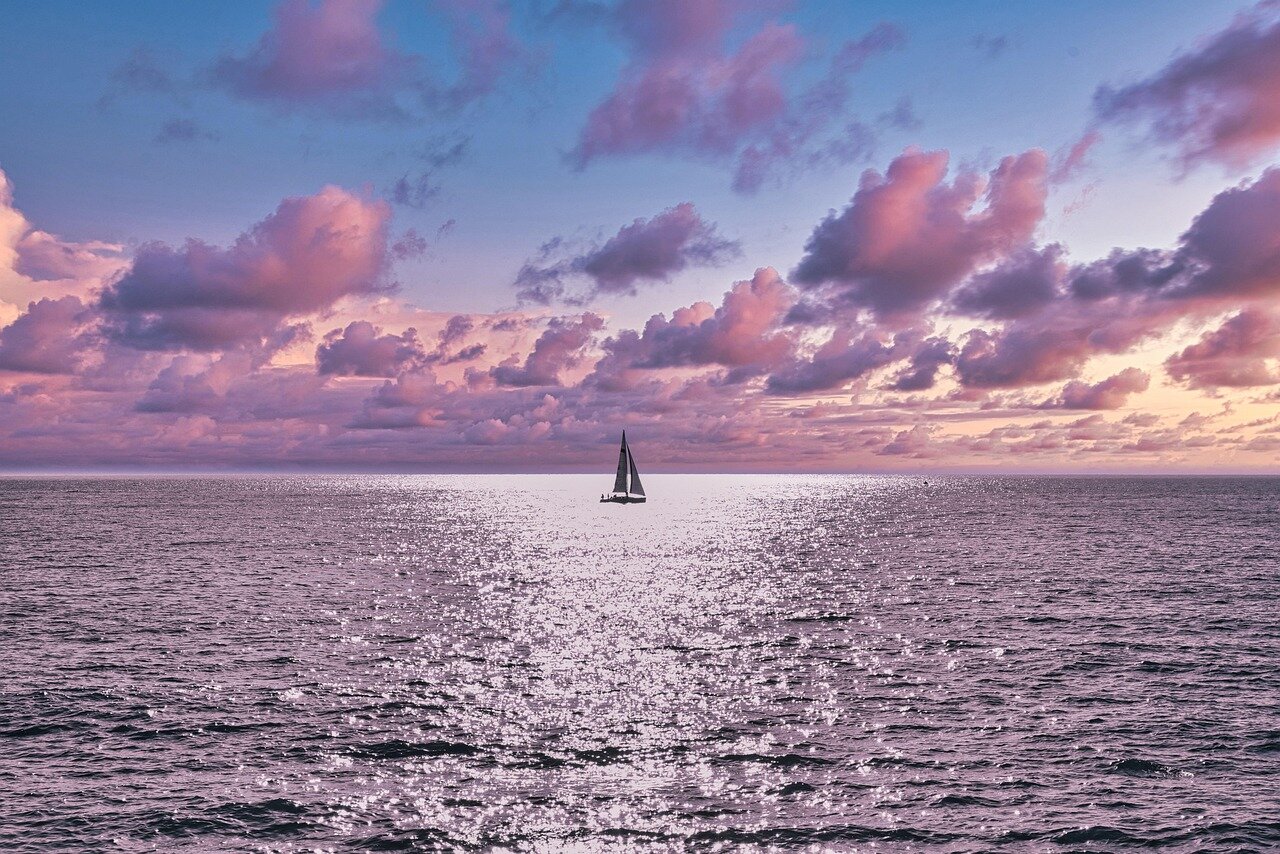A serene marina scene featuring a 3Dprinted boat gliding through the water, highlighting its innovative design
