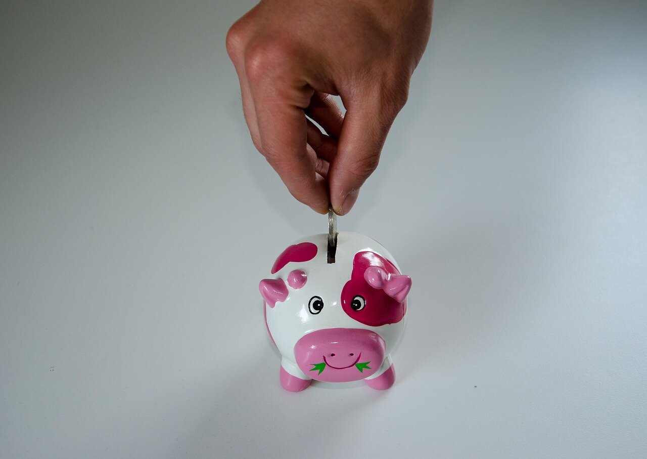 A concerned individual reviewing their savings account statement, noticing lower interest returns in the current financial landscape