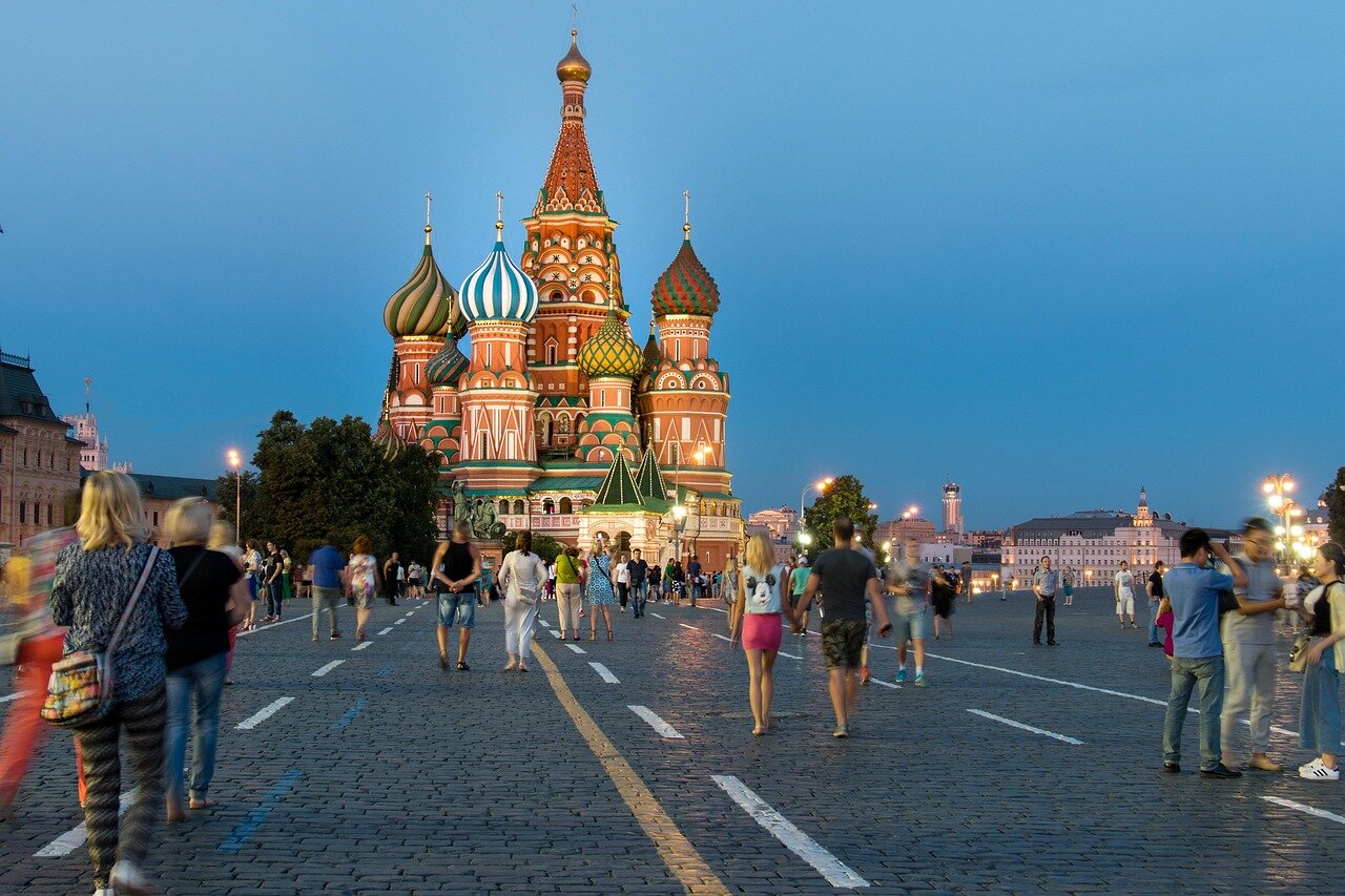 A bustling street in Moscow reflecting an atmosphere of unease following the recent car bombing incident