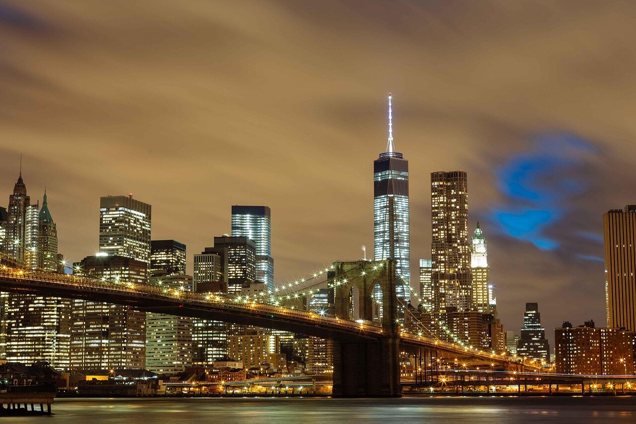 A bustling New York City street showcasing diverse people and technology, symbolizing the integration of AI in daily life