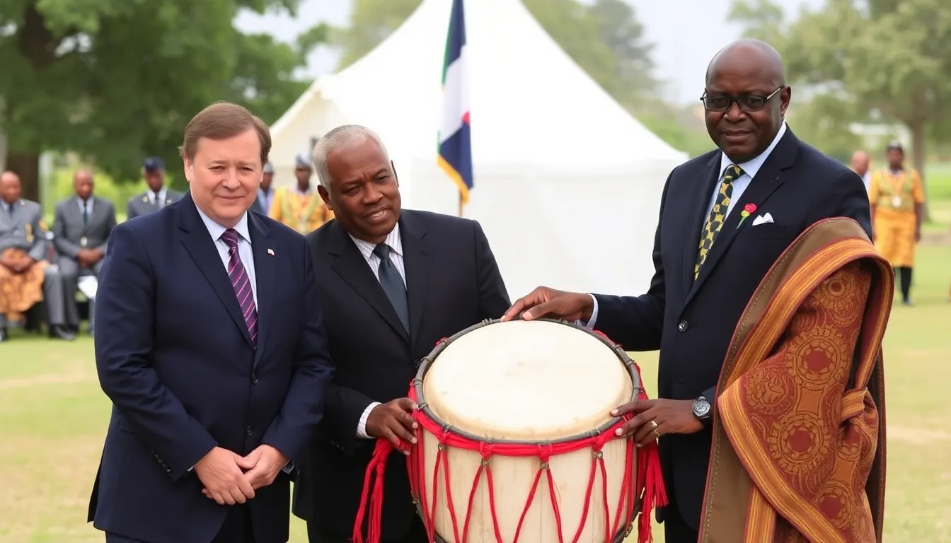 French and Ivorian officials participate in a ceremonial event marking the return of a sacred talking drum to Côte d'Ivoire, symbolizing cultural restitution and reconciliation.