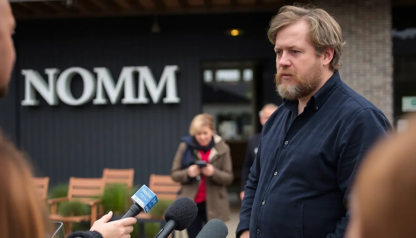 René Redzepi stands outside Noma, looking pensive as he addresses a small group of reporters following his resignation amid serious allegations of abusive behavior.