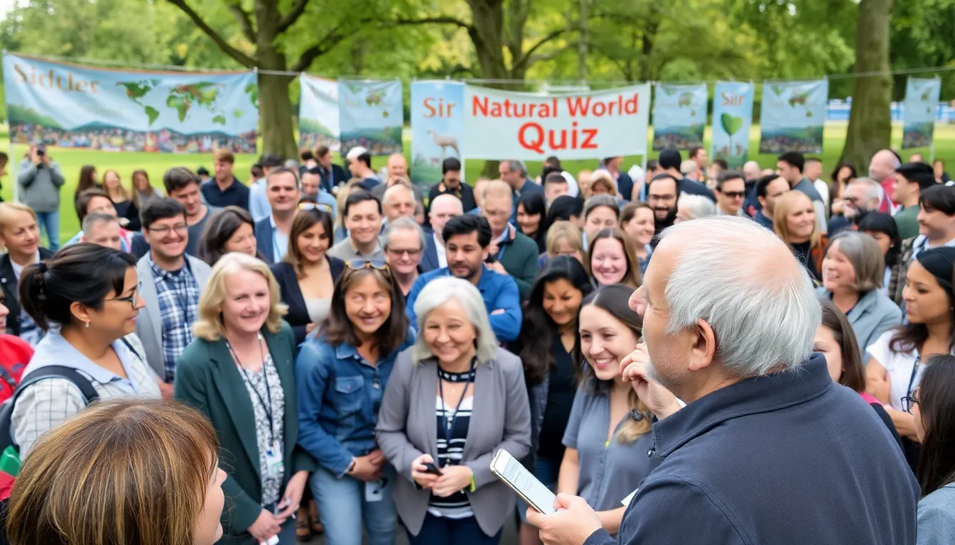 A large group of people eagerly participates in an interactive quiz event celebrating Sir David Attenborough's 97th birthday, with smiles and excitement evident on their faces as they engage with questions about the natural world.