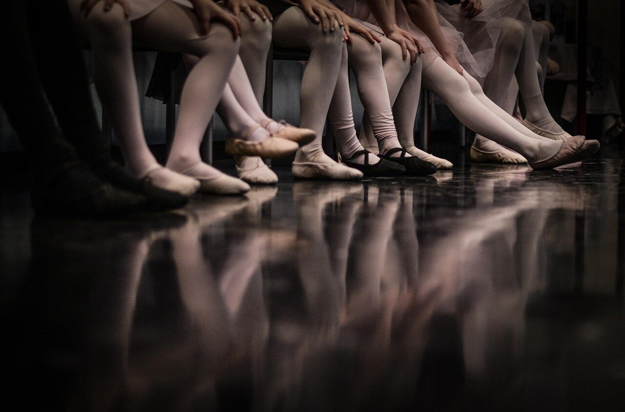 Female dancers showcase their strength and athleticism, breaking away from the delicate portrayals often associated with their roles in classical ballet