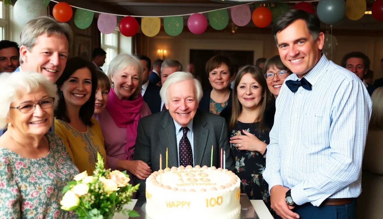 David Attenborough smiles warmly as he is surrounded by friends and family during a celebration of his 100th birthday, with decorations and a large cake in the background.