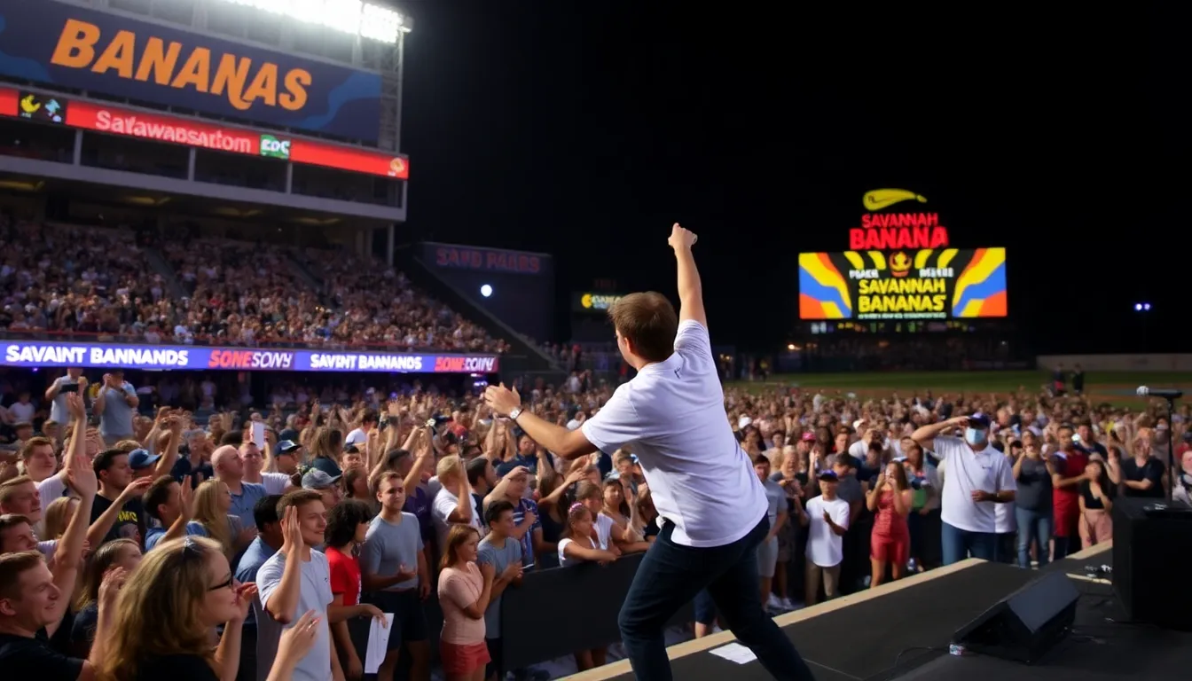 Derek Klena performs on stage in front of a lively crowd during a Savannah Bananas baseball game, showcasing his Broadway talents amidst the excitement of the event.