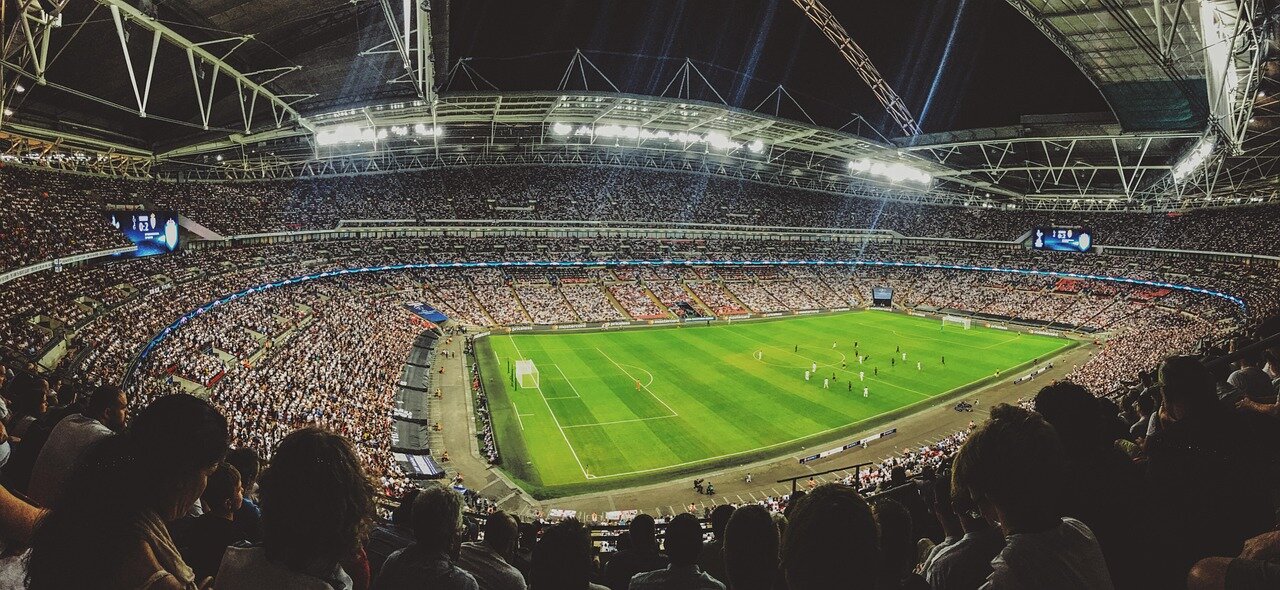 An iconic football club emblem representing the rich history and cultural significance of the sport in British society