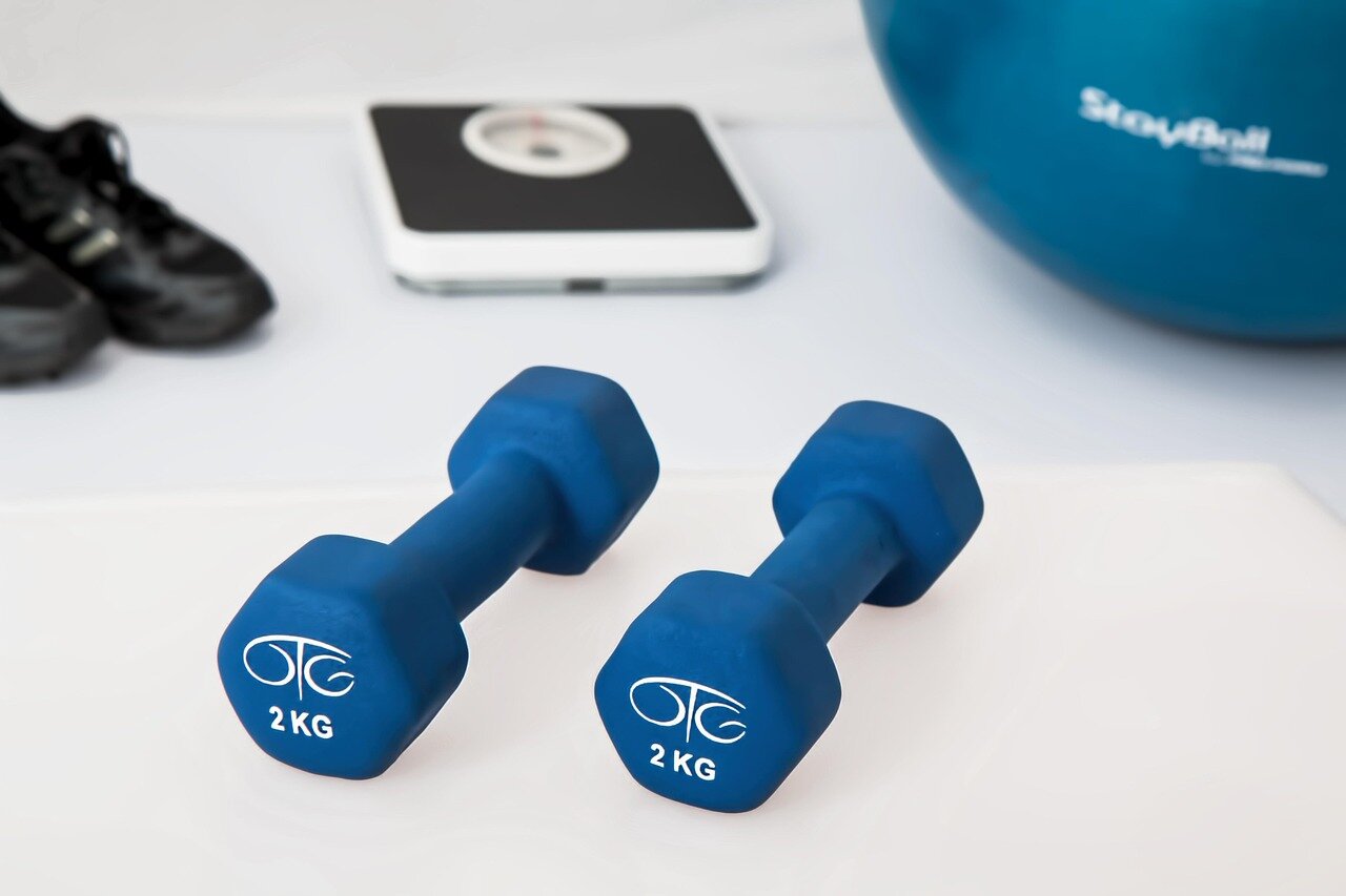 Astronauts utilize the Advanced Resistive Exercise Device (ARED) aboard the International Space Station, showcasing innovative fitness technology in action
