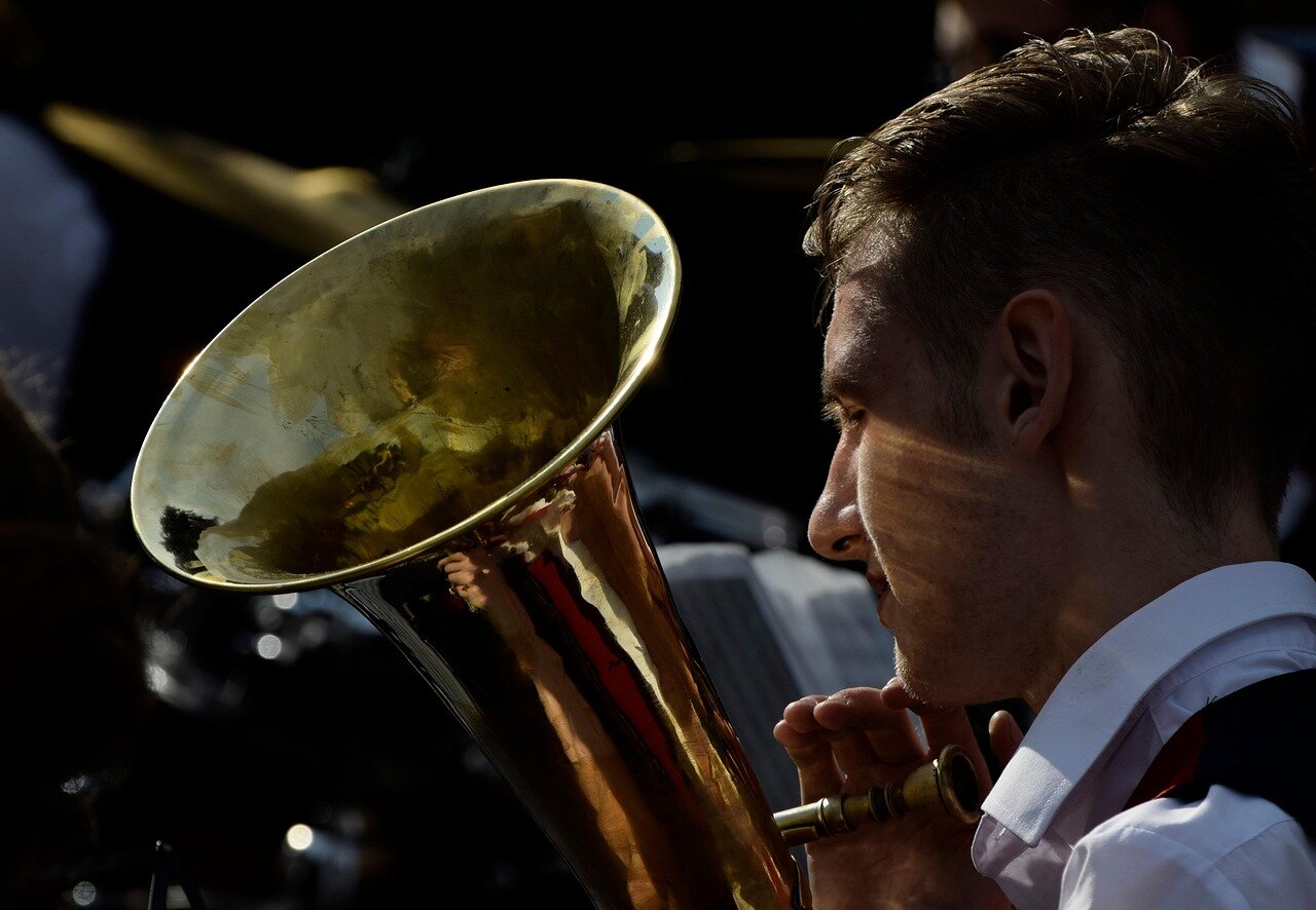 A dynamic rehearsal session where the new conductor collaborates with musicians, illustrating the creative energy and artistic vision for the orchestra's future