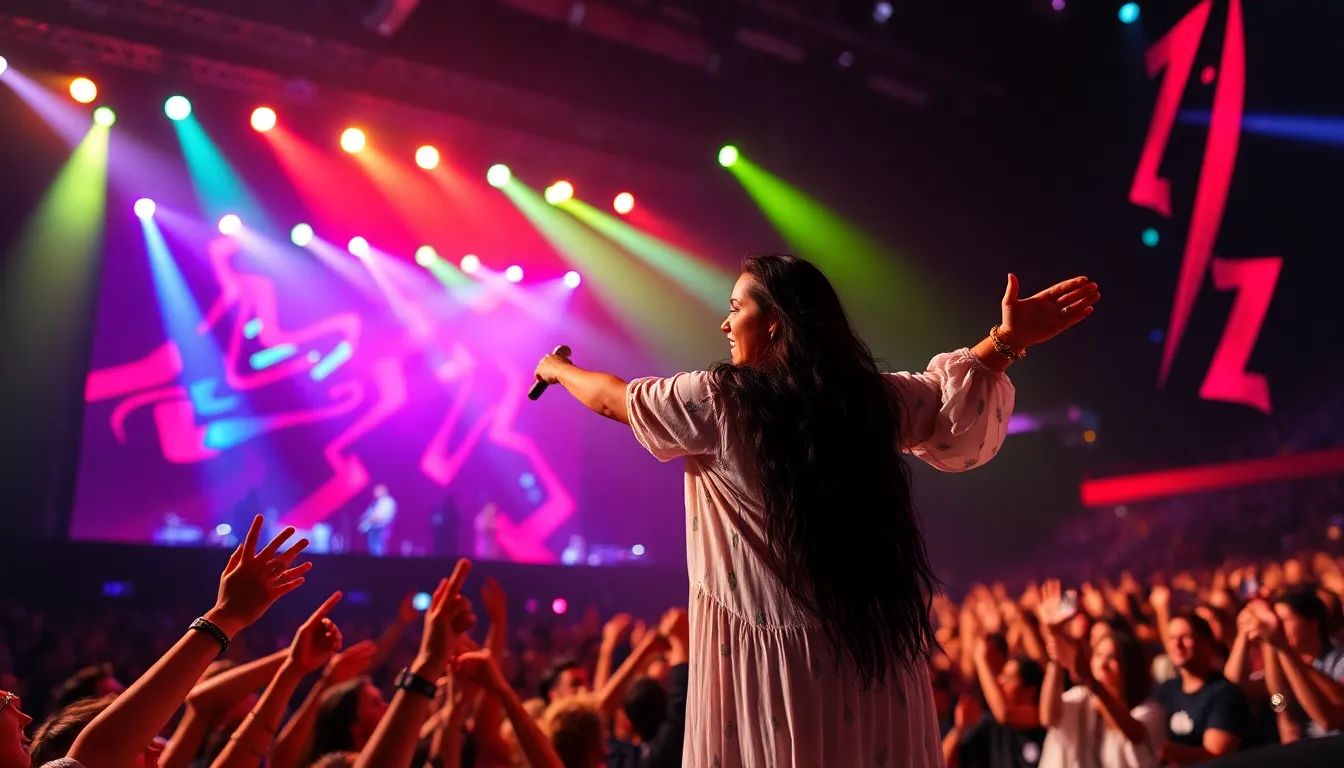 Rosalía performs energetically on stage at the O2 Arena in London, reaching towards the audience as colorful lights illuminate the venue.