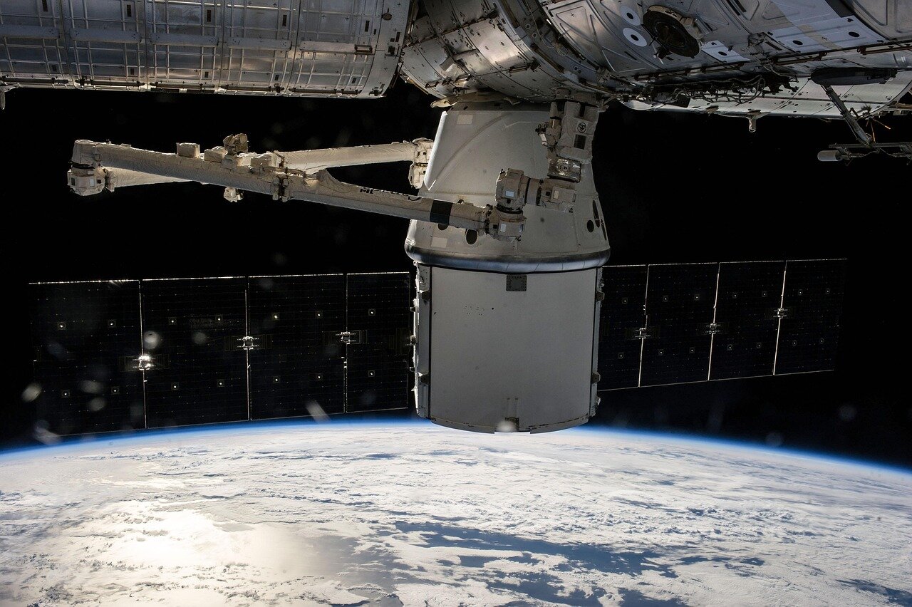 A SpaceX team analyzing data from previous Starship test flights in a hightech control room