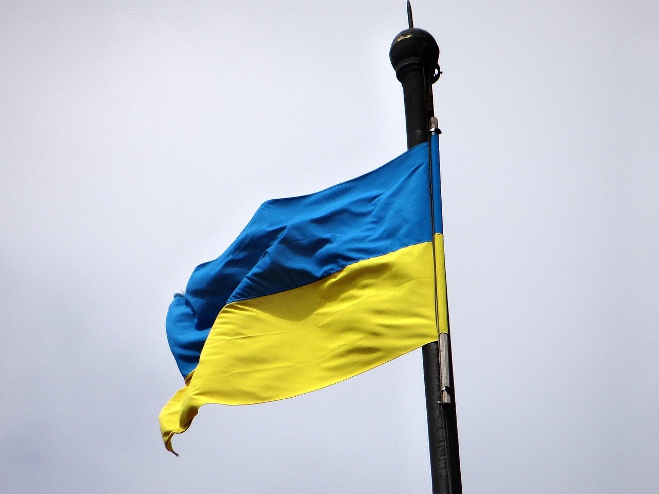 Local defense forces mobilizing in response to Russian troop movements, highlighting the ongoing tensions in the region