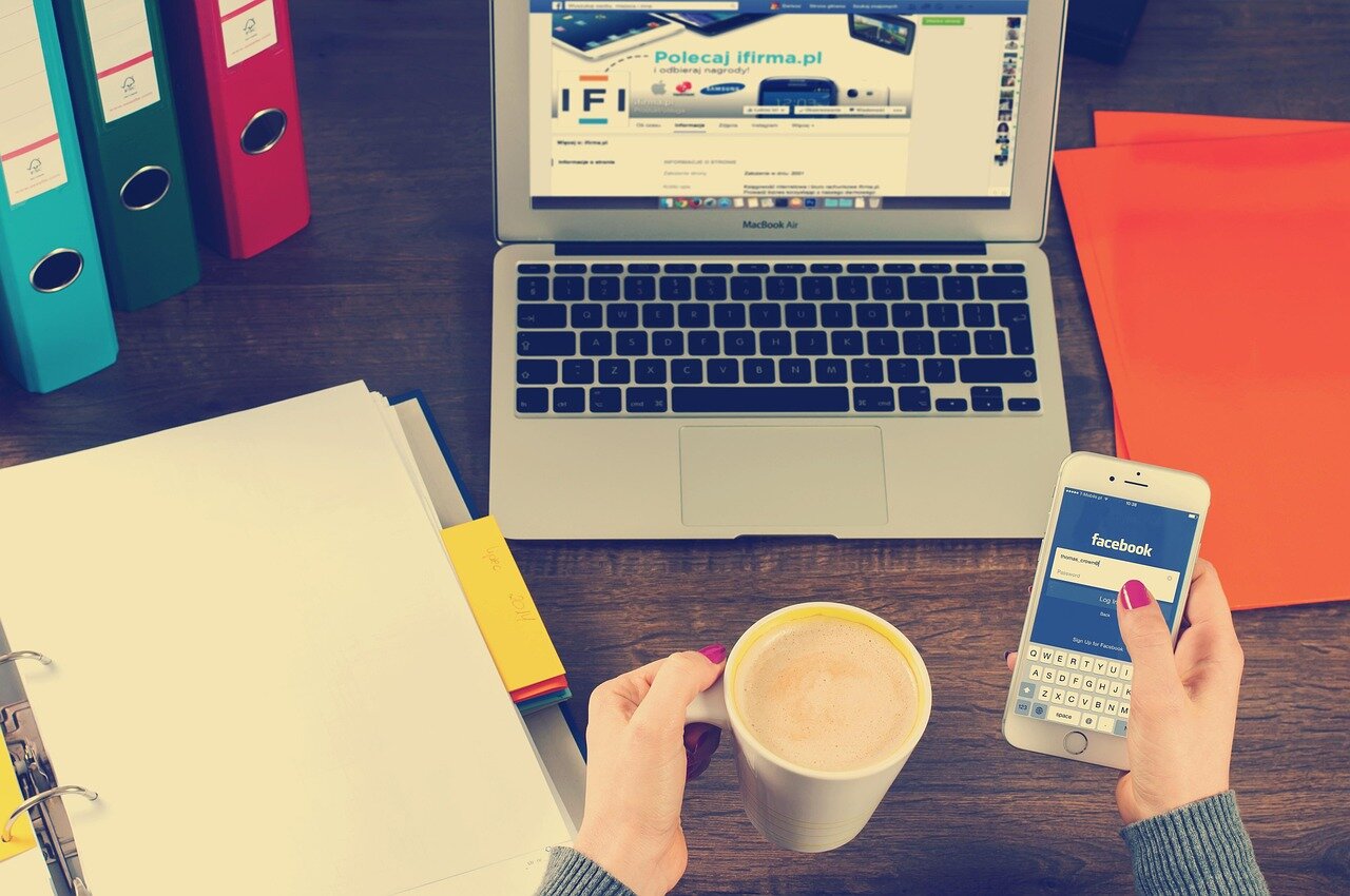 A vibrant Vox Media office filled with creative professionals collaborating on innovative content that attracts a younger audience