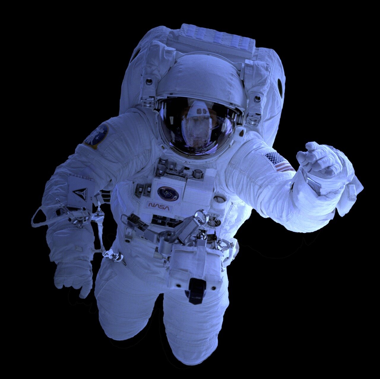 Astronauts aboard the International Space Station are seen resuming their scientific experiments and maintenance tasks after receiving clearance following a temporary evacuation due to space debris.
