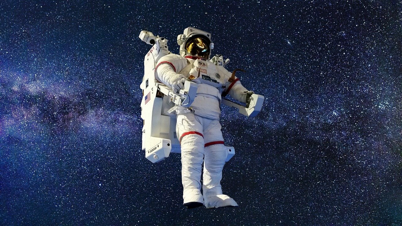 A collaborative meeting among astronauts from various space agencies discussing safety protocols and mission objectives