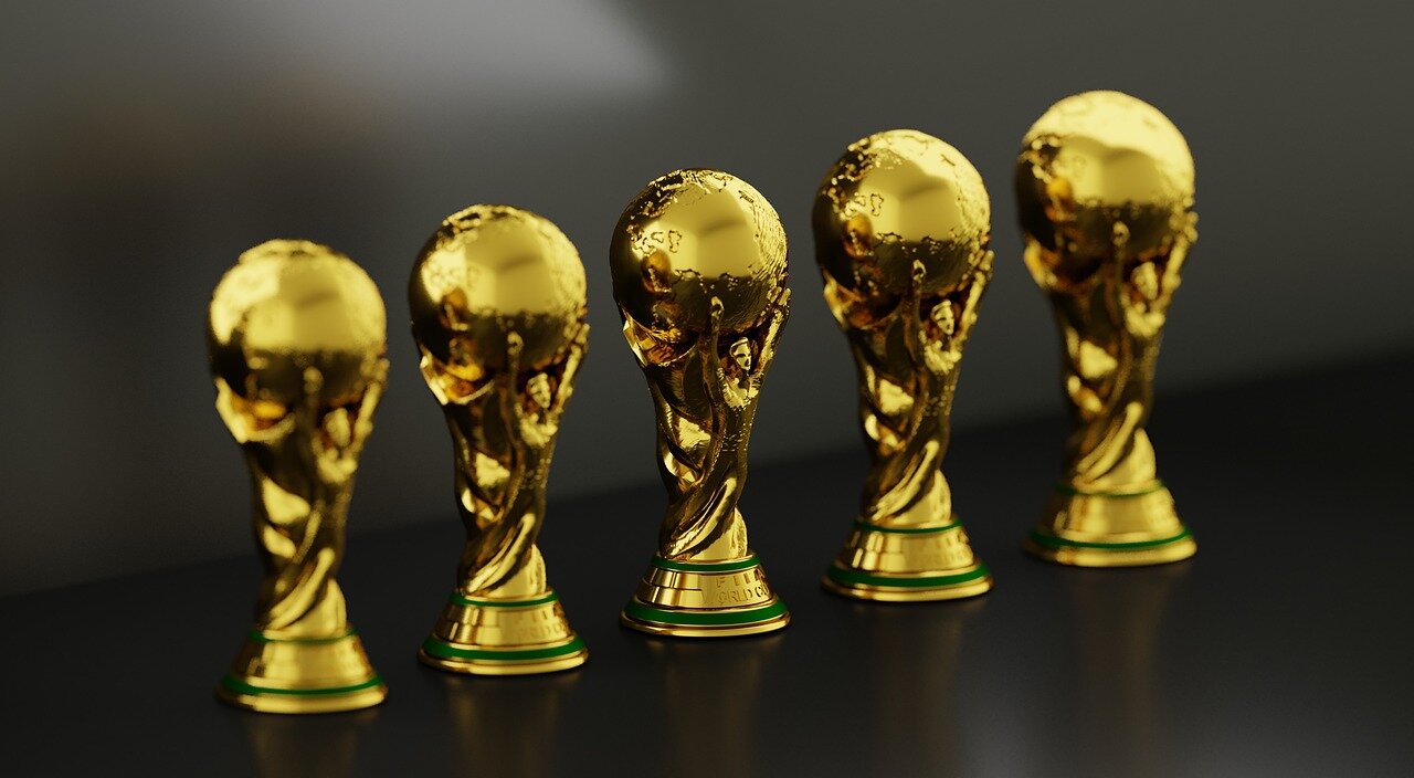 A diverse group of musicians and industry professionals gather at a press conference to celebrate the announcement of new Asian Pop and Latin song categories for the upcoming Grammy Awards.