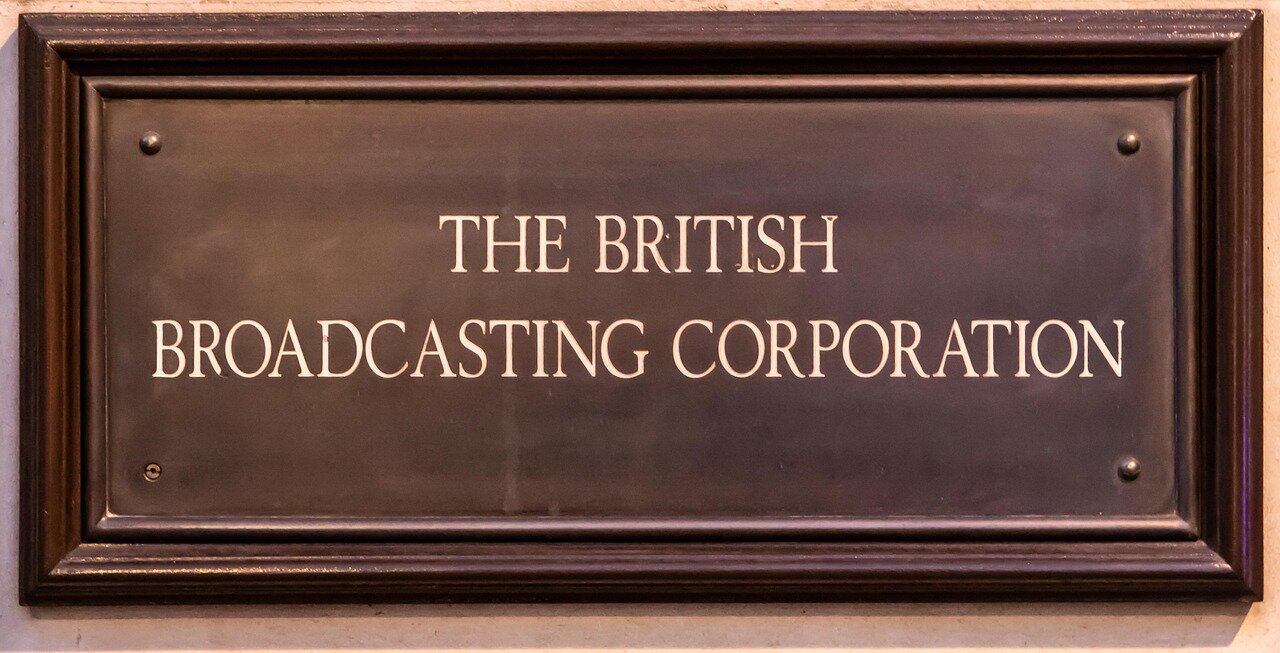 Policymakers and educators collaborating to promote science literacy and public understanding, inspired by BBC Inside Science's content