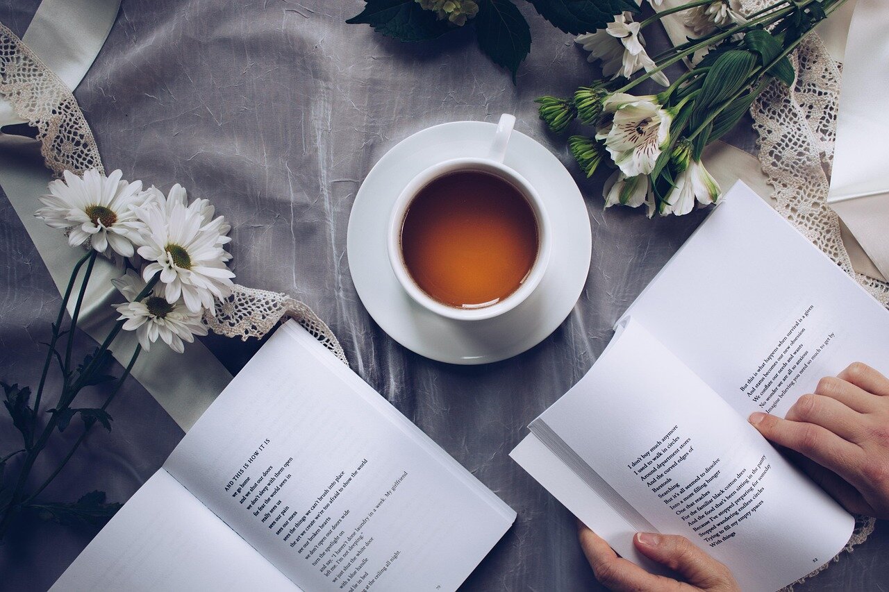 A lively book club meeting where members passionately discuss the themes of the latest titles, highlighting the social aspect of reading in contemporary culture