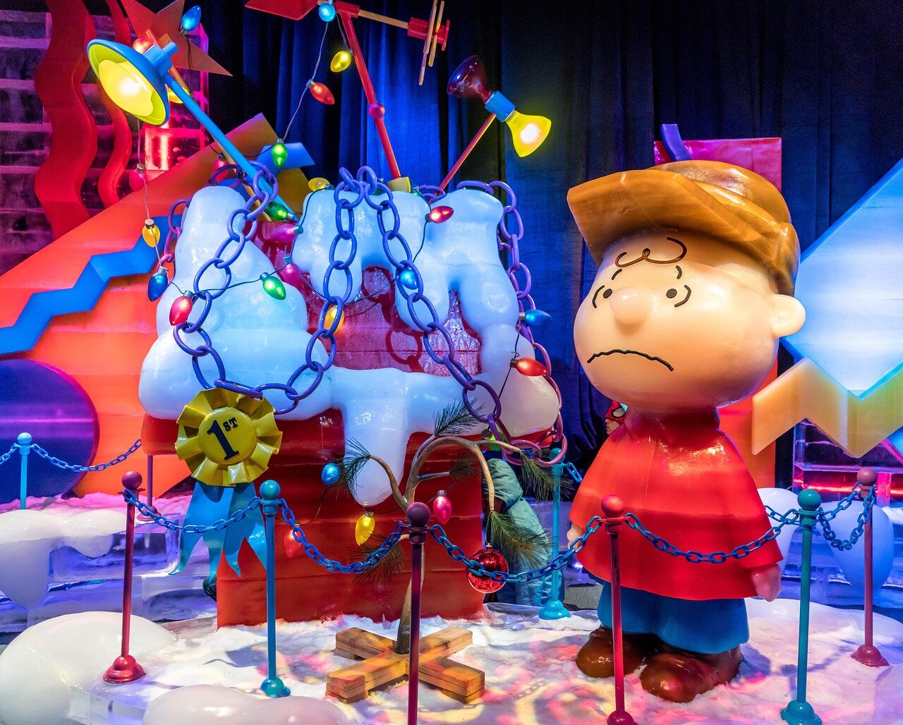 A scene captures the tension as discussions unfold among fans regarding the adaptation's departure from the original novel's plot
