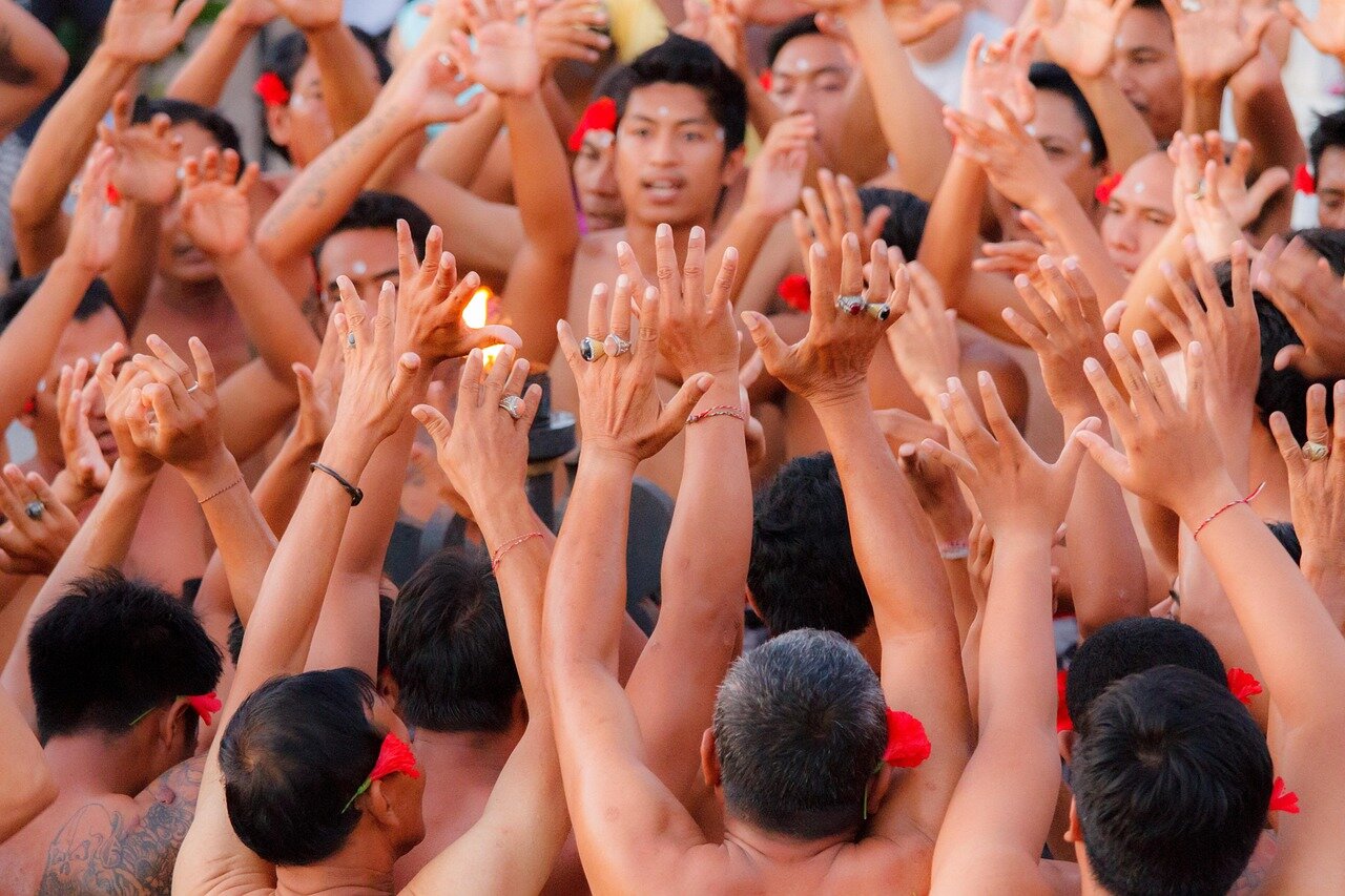 Young dancers eagerly learn from their older counterparts, showcasing a rich exchange of techniques and stories that span generations