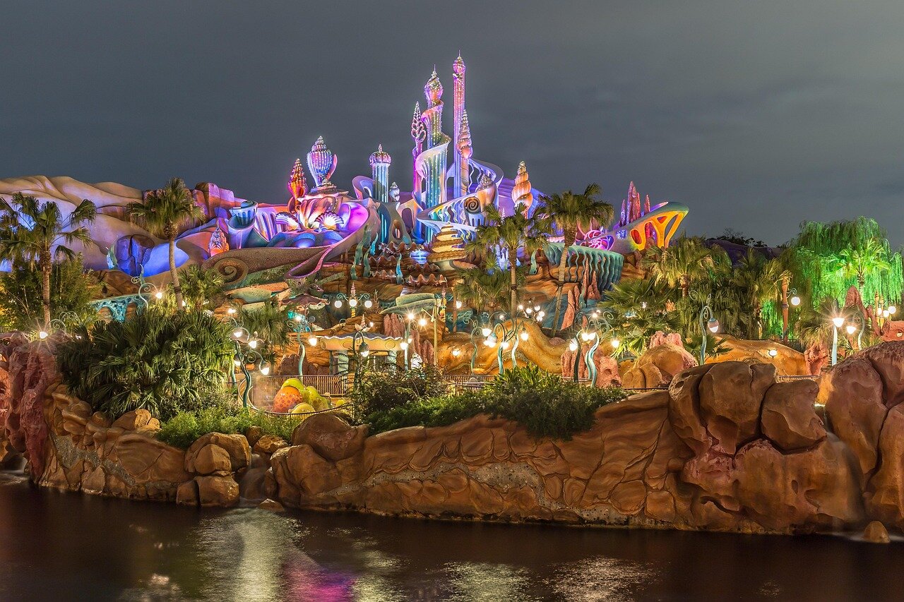Visitors stroll through the nearly empty streets of Disneyland Paris, highlighting the significant decline in attendance amid ongoing financial challenges.