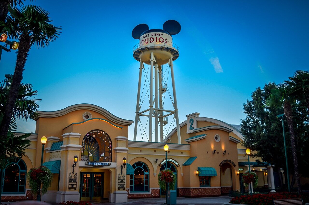 A busy local restaurant filled with tourists, emphasizing the interconnection between Disneyland Paris and surrounding businesses that rely on park visitors