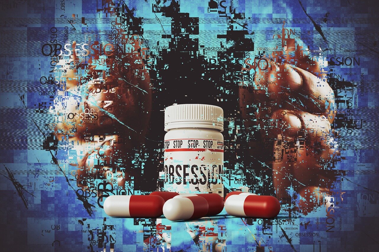 A group of researchers discusses findings on muscle loss associated with obesity medications during a conference, surrounded by charts and data presentations.