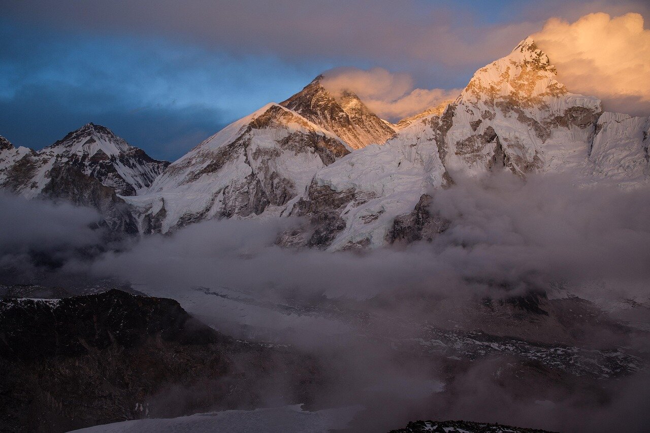 A group of climbers preparing for their ascent, emphasizing the importance of safety protocols and proper preparation for highaltitude expeditions