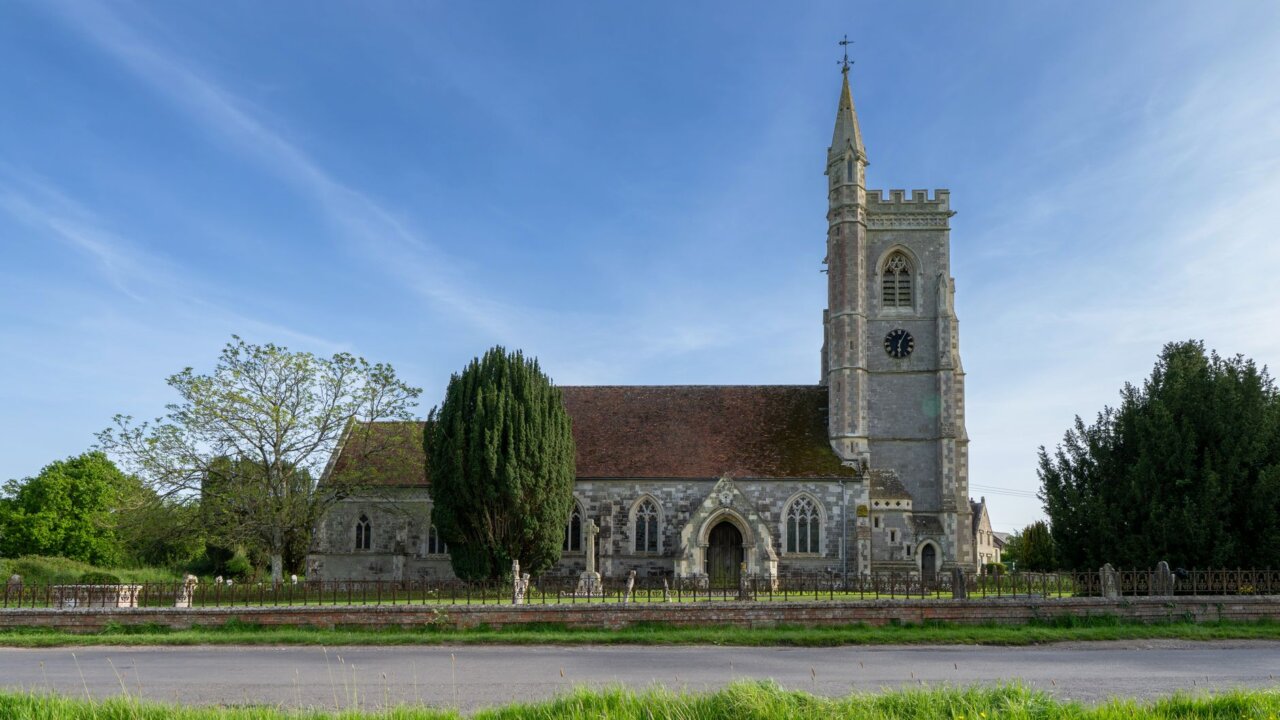 A group of fans gathers outside a quaint church in the village of Grantchester, eagerly discussing their favorite moments from the beloved drama series as they prepare for the final season premiere.