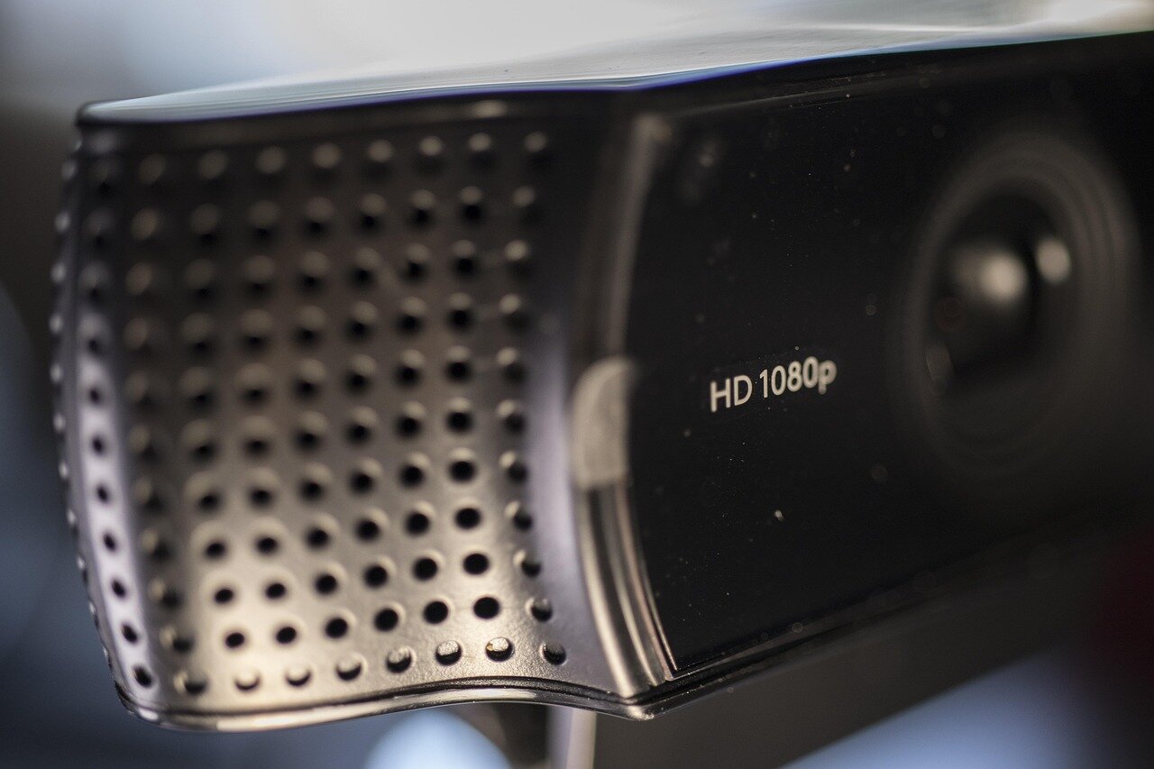 A young activist holding a protest sign, symbolizing the rising involvement of youth in social and political movements featured in the show
