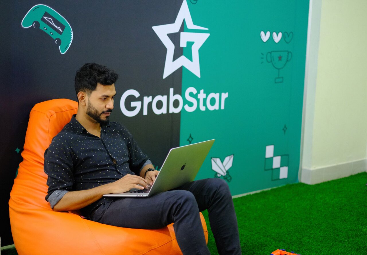 A closeup of a computer screen displaying advanced data analytics and machine learning algorithms, highlighting the technological focus of JioHotstar's recruitment drive