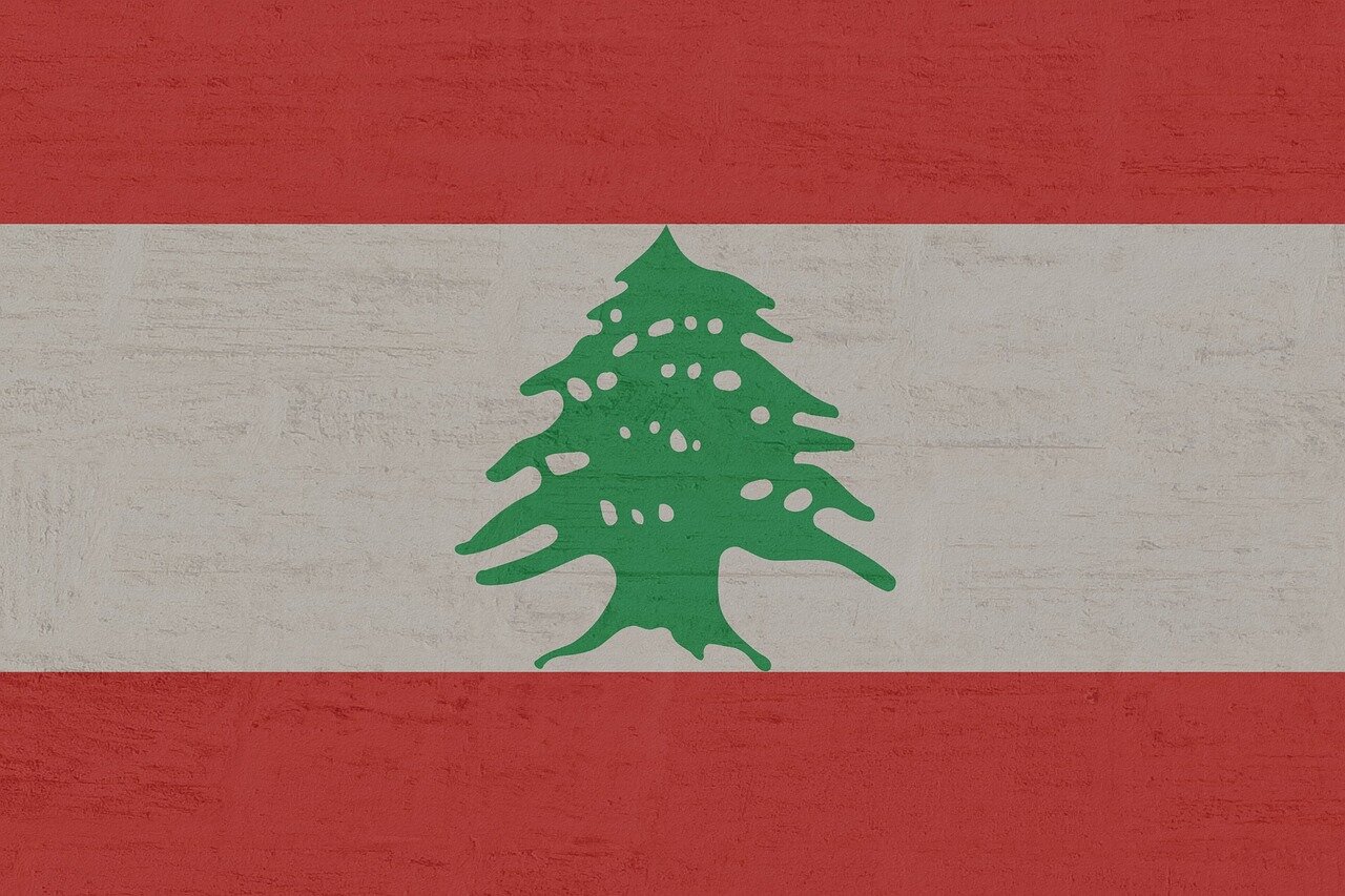 Thousands of protesters gather in downtown Beirut, holding banners and chanting slogans against the government in response to a controversial maritime deal with Israel.