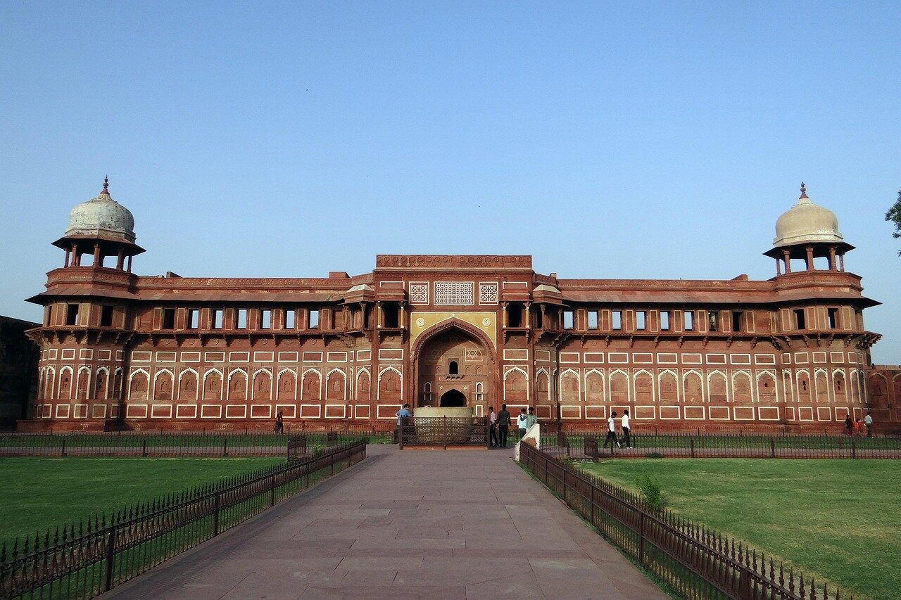 Merchants bustling in a vibrant marketplace showcase the thriving trade networks that connected Mughal India to Europe and beyond