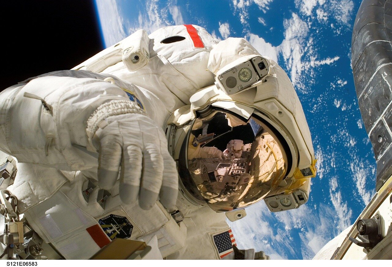The Apollo 11 mission is celebrated as Neil Armstrong and Buzz Aldrin take their historic moonwalk, representing a monumental achievement for humanity