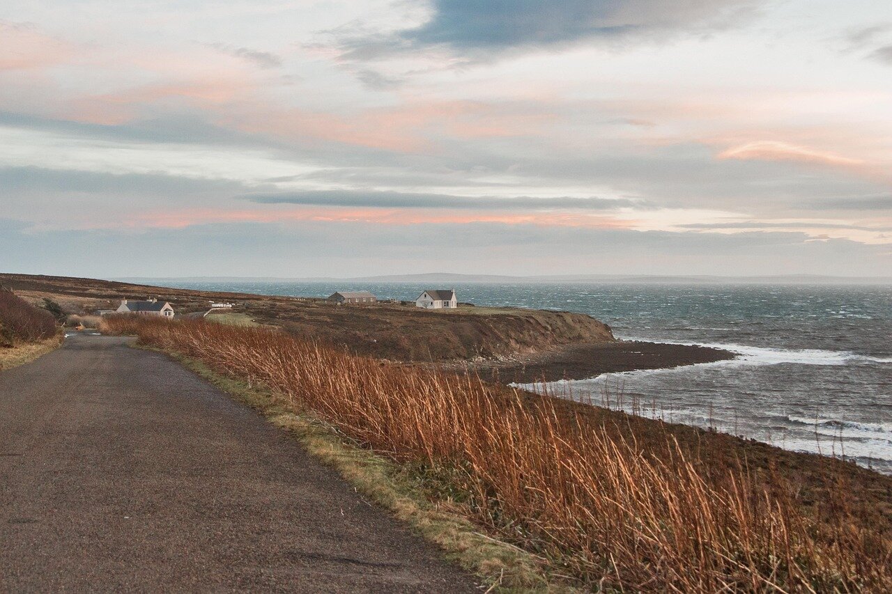 A scenic view of Orkney's landscape, symbolizing the region's historical roots and its significance as a cultural hub during the festival