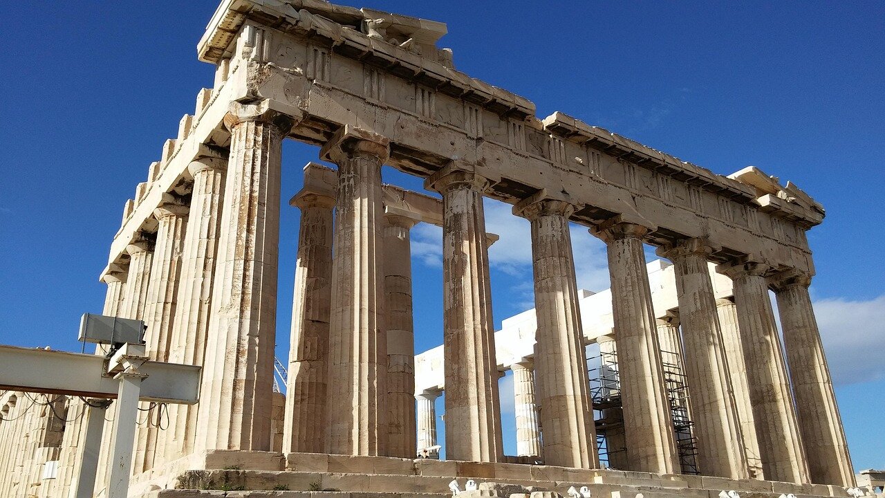 Restoration workers carefully install fresh marble fillings on the Parthenon, highlighting the ongoing efforts to preserve the ancient monument's structural integrity and aesthetic appeal.