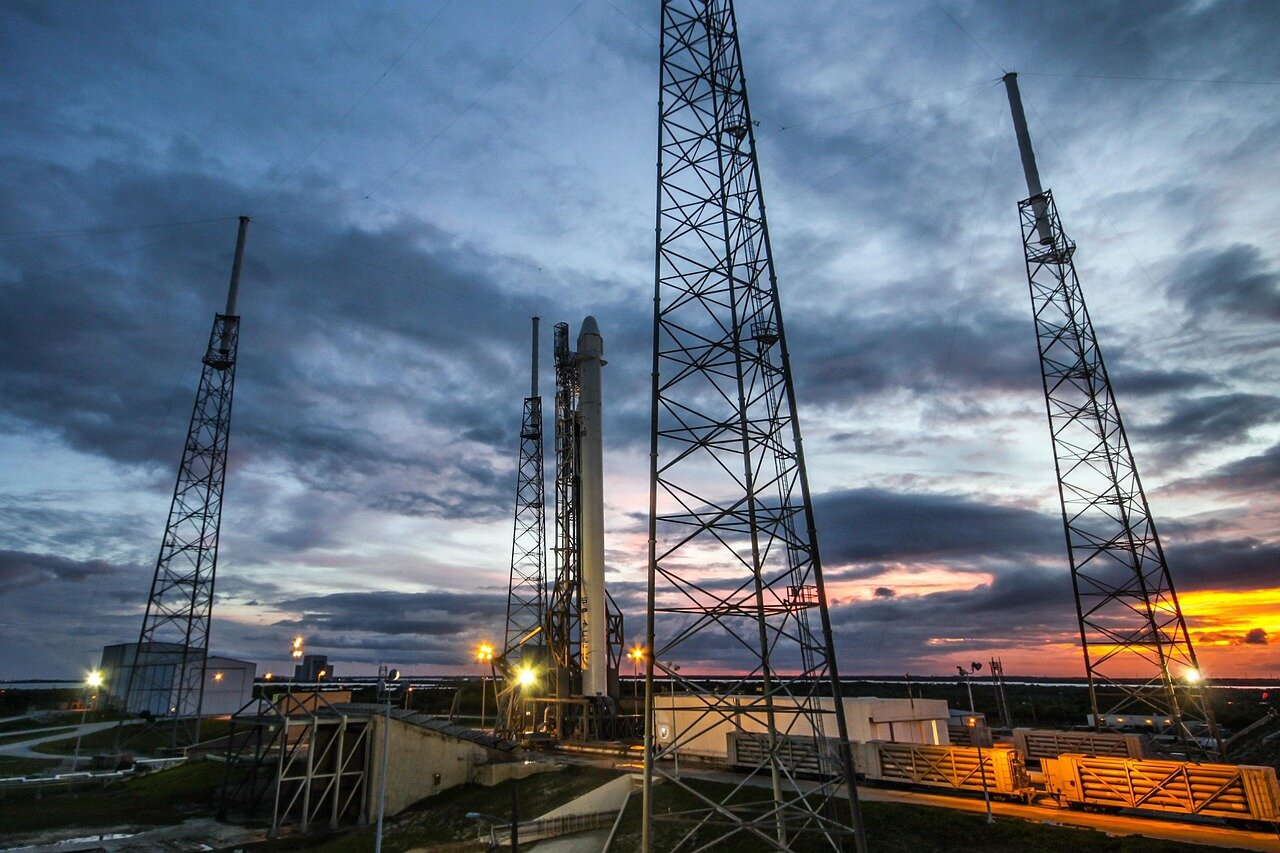 A group of investors analyzing stock market trends, reflecting the growing interest in SpaceX's upcoming IPO and its potential impact on the aerospace industry