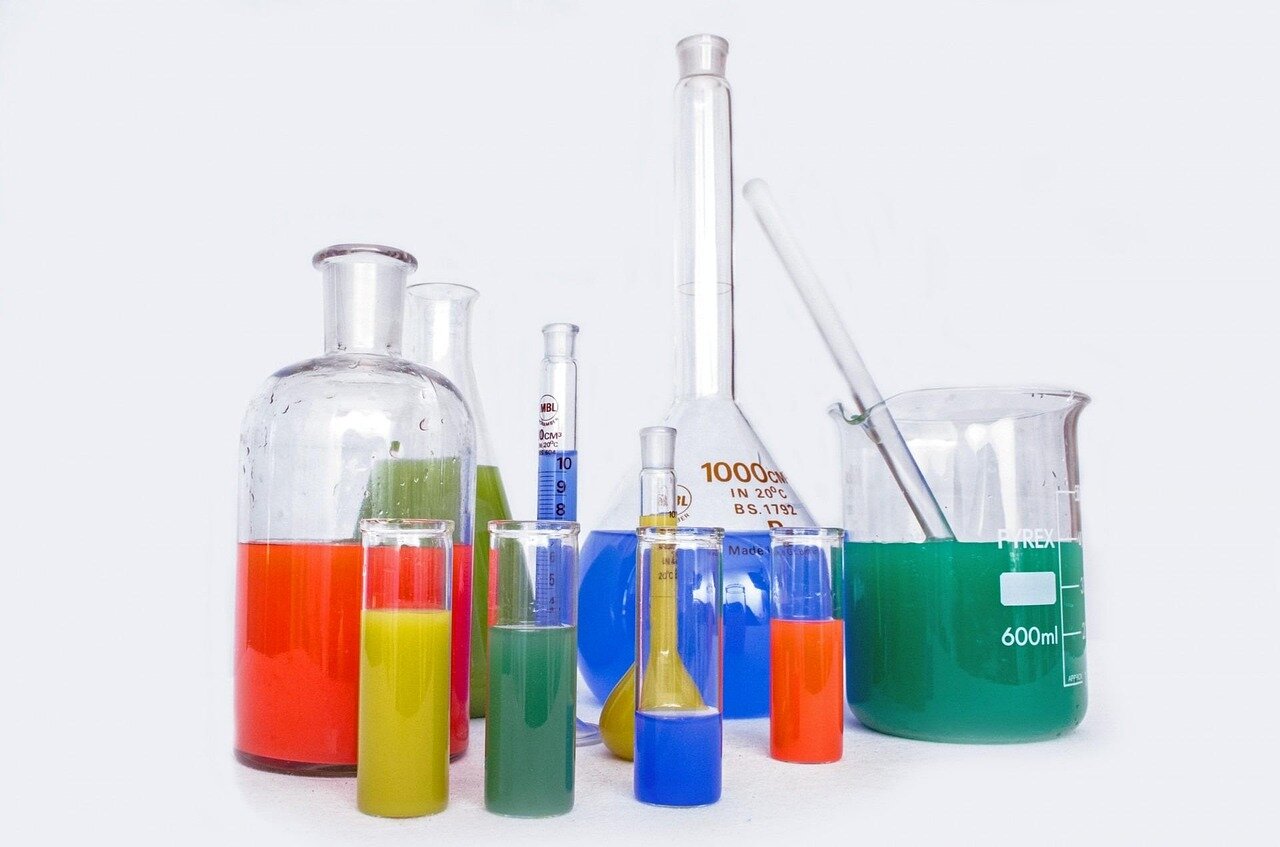 Public health officials analyzing data from wastewater testing to identify trends in drug consumption in urban areas
