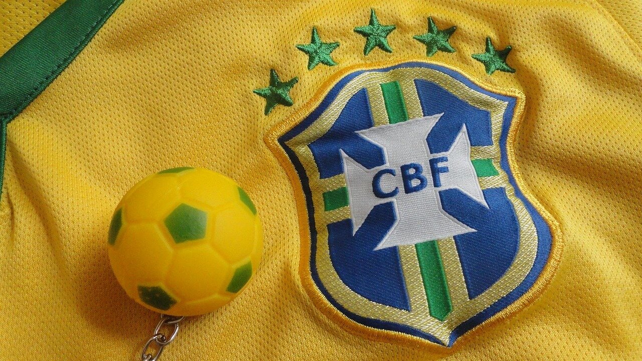 Fans from various countries gather in a vibrant stadium, waving flags and cheering enthusiastically as they celebrate the excitement of the World Cup.