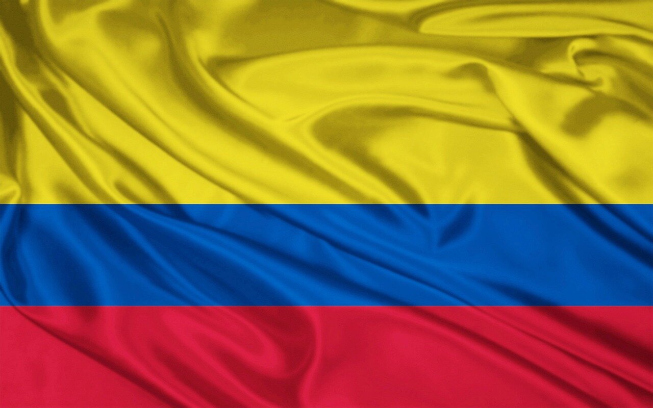 A vibrant scene showcasing Colombian filmmakers and creators who may benefit from increased support and partnerships with Netflix under Londoño's leadership