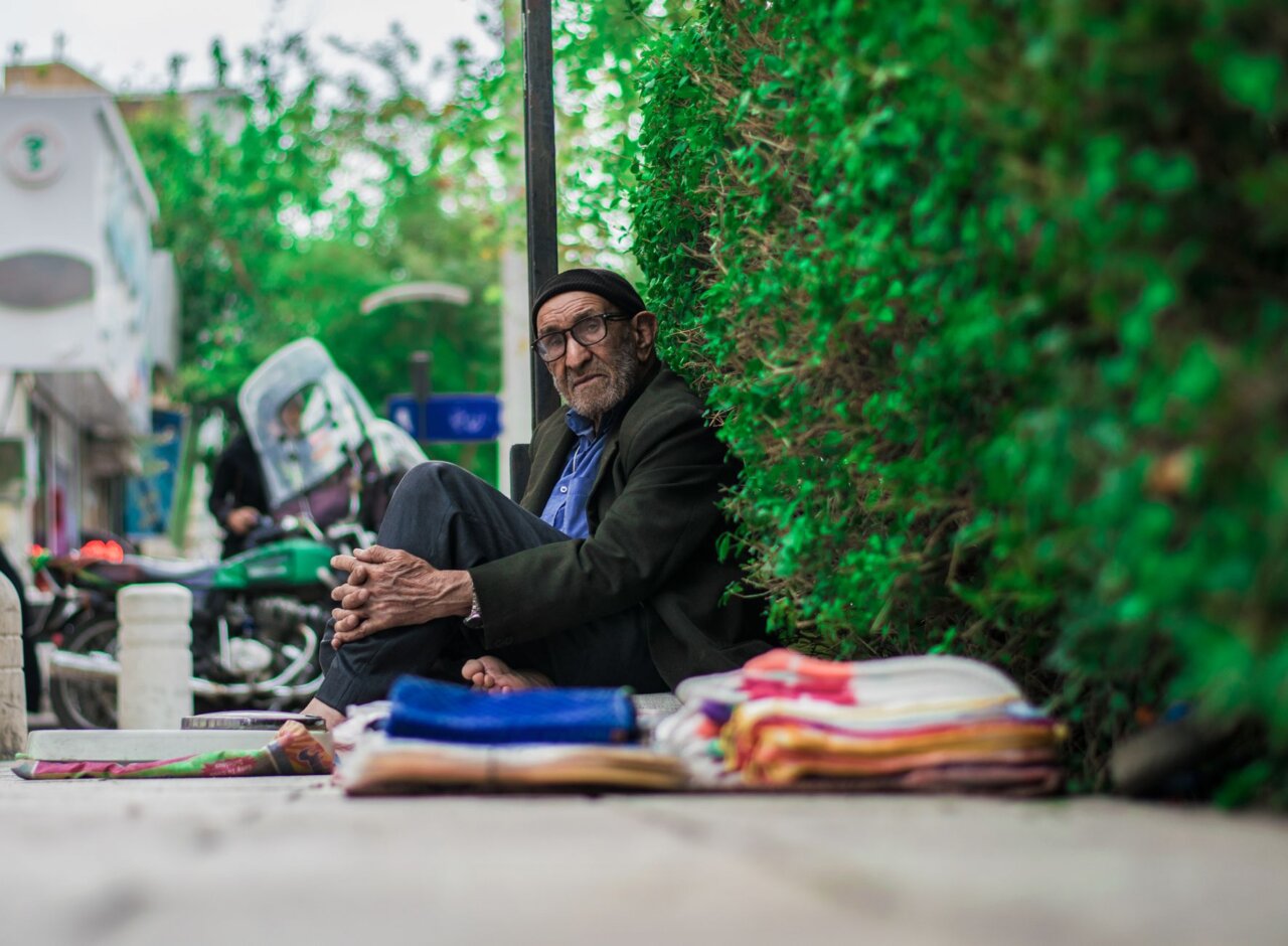 Families participating in traditional mourning rituals, reflecting the cultural significance of timely burials in Islamic practices