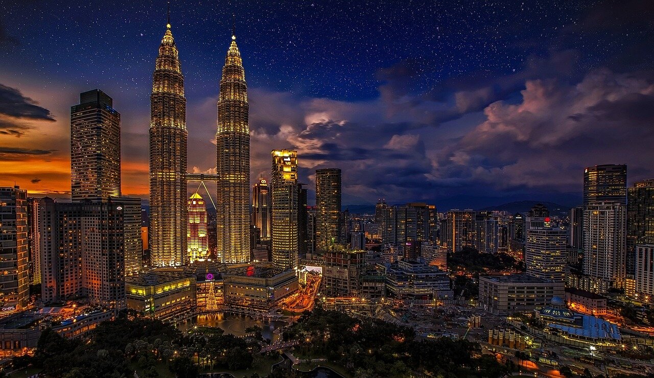 A powerful depiction of a military confrontation highlights the film's focus on the complexities of war and its profound effects on Malaysian society