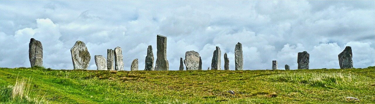 Archaeologists excavate a circular arrangement of wooden posts at the newly discovered site near Stonehenge, revealing insights into prehistoric ceremonial practices.